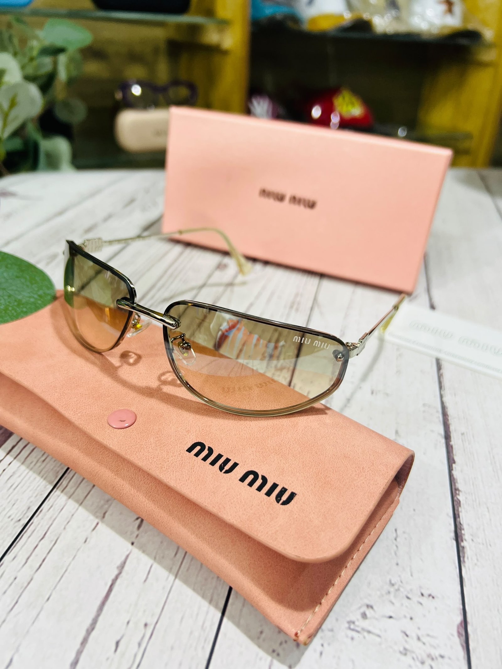 MIUMIU SUNGLASSES 01